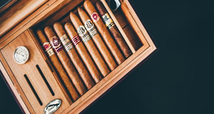 A wooden box with cigars